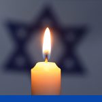 Kerze vor Israelflagge